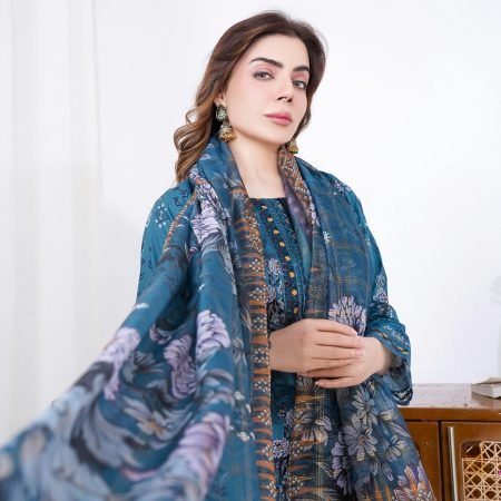 A fashion model poses gracefully in a luxurious shalwar kameez, epitomizing Pakistani elegance.